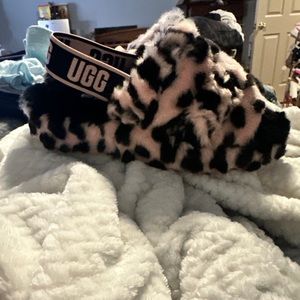 UGG slippers pink and black color size 7 Brand new